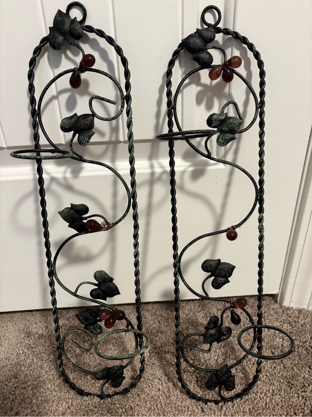Decorative Black Metal Wall Rack With Tea Candle HolderPaired with Amber Accents